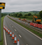 A rural dual carriage way with roadworks and speed cameras